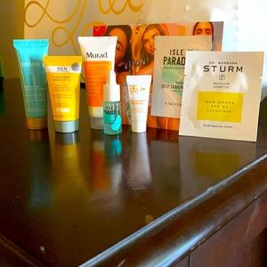 Sunscreen lot. Ren, biossance, mural, tan drops